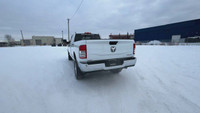 This Ram 2500 is equipped with: Cloth Front 40/20/40 Bench Seat, Radio: Uconnect 5 w/8.4 Display, 4G... (image 7)