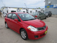 All our listed prices are cash price plus tax. 2010 Nissan Versa SL comes with Cloth Interior, Tract... (image 2)
