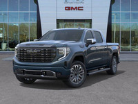 The 2025 GMC Sierra 1500 Denali Ultimate, finished in Downpour Metallic with a refined Alpine Umber... (image 1)