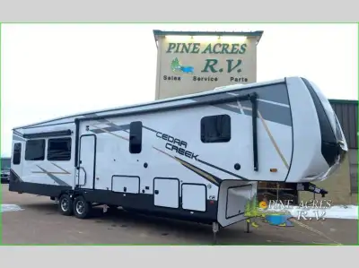 Forest River Cedar Creek fifth wheel 377BH highlights: Two Bedrooms Mid-Bunk / Office....with a Loft...