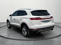 Experience refined luxury and smooth performance with this 2015 Lincoln MKC – a stylish compact SUV... (image 2)