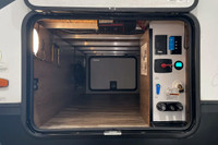 The 2023 Grand Design Imagine 2500RL is a rear-living travel trailer that blends residential comfort... (image 8)