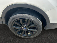 Get the NEW look for the USED price! This 4WD Ford Escape is White in color and is equipped with an... (image 8)