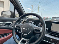 The 2023 Kia Sportage offers turbocharged performance with all-wheel drive and performance tires fro... (image 9)