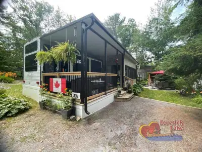 Forest River Wildwood Grand Lodge destination trailer 42DL highlights: Loft Kitchen Island Main Pati...