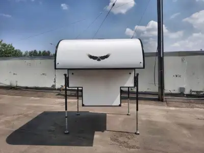 Soaring Eagle ADLAR truck camper 6.5XL highlights: 30in.in. Dinette Large Wardrobe Portable Toilet P...