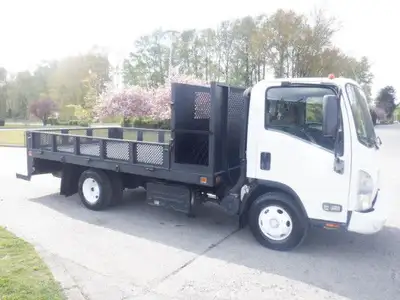 2015 Isuzu NPR 12 Foot Flat Deck 3 Seater Diesel 5.2L L4 DIESEL engine Width of the deck is 8 foot....