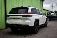 This 2023 Jeep Grand Cherokee is for sale today. This SUV has 85,063 kms. It's blue/white in colour... (image 2)