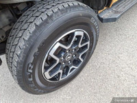 Turn heads and conquer any terrain in this vibrant 2021 Ford Bronco! This eye-catching yellow conver... (image 8)