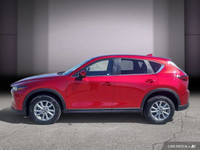 Le Mazda CX-5 GS AWD 2024 est un VUS compact qui se distingue par son design élégant et ses performa... (image 3)
