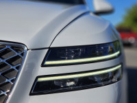 Experience the impressive 2023 Genesis G80 2.5T Advanced, a stunning white all-wheel-drive sedan tha... (image 3)