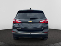 Offering excellent driving manners, this Chevrolet Equinox is Nightfall Grey Metallic in color and i... (image 3)