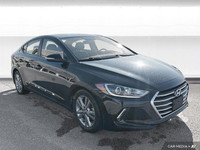 The 2017 Hyundai Elantra in Space Black Pearl features heated front seats, a heated leather steering... (image 7)