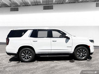 The 2022 Chevy Tahoe 4WD includes leather seating, heated front seats, heated mirrors, and tri-zone... (image 6)