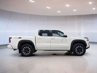 The 2023 Nissan Frontier Pro-4x, available at Moose Jaw Honda, is a robust and reliable truck design... (image 3)