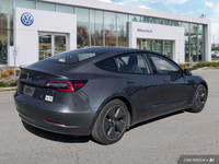 This Tesla Model 3 delivers a Electric engine powering this Automatic transmission. Window Grid Ante... (image 4)