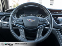 Finished in a Crystal White Tricoat exterior that complements the Black leather interior, standing o... (image 9)