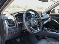 Experience the smooth power of this 2023 Nissan Rogue SV Moonroof, boasting a fuel-efficient turboch... (image 9)
