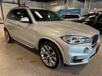 Our 2015 BMW X5 xDrive35i gives you the comfort of an SUV and the spirit of a sports car in Silver M... (image 6)