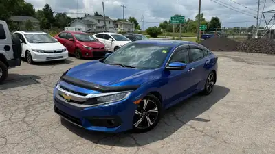 Anti-Lock Brakes;Driver Air Bag;Fog Lights;Passenger Air Bag;Security System;Side Air Bag;Traction C...
