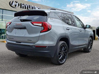 Experience the versatility and efficiency of the 2024 GMC Terrain SLE, a used SUV boasting a powerfu... (image 4)