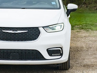 The *2023 Chrysler Pacifica Touring L* is a front-wheel-drive minivan designed for family comfort an... (image 3)