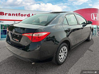 This 2019 Toyota Corolla LE boasts a sleek Black Sand Pearl exterior and a comfortable black interio... (image 5)