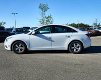 KBB.com 10 Best Sedans Under $25,000. This Chevrolet Cruze boasts a Turbocharged Gas I4 1.4L/83 engi... (image 1)