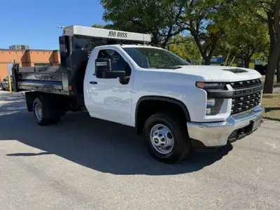 DUMP TRUCK with Hydraulic Lift in excellent condition with a clean carfax and one previous owner. Wi...