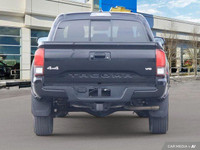 From work to weekends, this previous daily rental Black 2023 Toyota Tacoma muscles through any terra... (image 4)