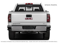 Powerful presence meets sophisticated comfort in the 2018 GMC Sierra 1500 SLT, graced with a Dark Sl... (image 4)
