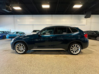 Our outstanding Blue 2015 BMW X1 xDrive35i offers fun driving dynamics great versatility and awesome... (image 1)