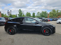 Unleash instant torque and futuristic performance with this 2023 Tesla Model Y Performance—solid bla... (image 6)
