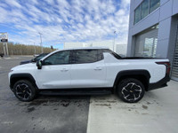 The 2025 Chevrolet Silverado EV Extended Range LT in Summit White is a groundbreaking and capable al... (image 4)