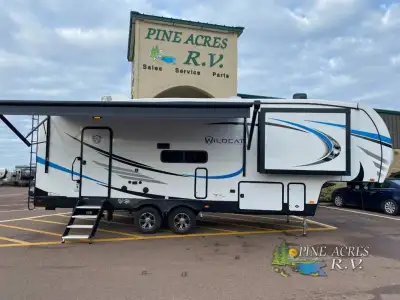 Forest River Wildcat fifth wheel 260RD highlights: Dual Entry Bath TV and Fireplace Exterior Removab...