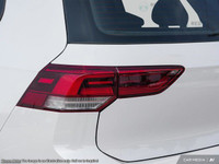 The 2025 Volkswagen Golf GTI in a striking white finish is a front-wheel-drive dynamo engineered to... (image 9)
