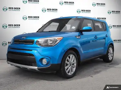 Experience the vibrant charm of the 2019 Kia Soul, presented in an eye-catching blue, paired with it...