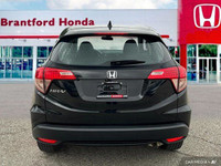 Sleek, black exterior and impressive fuel efficiency—this 2016 Honda HR-V LX is ready for your next... (image 4)