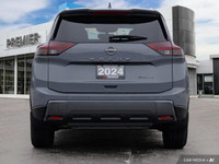 This 2024 Nissan Rogue SL boasts a stunning Boulder Grey Pearl exterior and a sophisticated Graphite... (image 4)