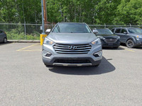 Experience the commanding presence and versatile functionality of this 2015 Hyundai Santa Fe XL Luxu... (image 1)