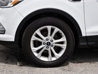 The 2018 Ford Escape SE is a compact SUV that, offers a mix of practicality and sportiness. The inte... (image 9)