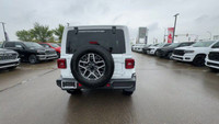 This 2025 JEEP WRANGLER 4-DOOR SAHARA has the following options Cloth Low-Back Bucket Seats, Remote... (image 9)