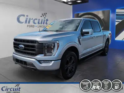 Le Ford F-150 Lariat Hybride 2023 impressionne avec sa capacité de remorquage robuste et sa génératr...