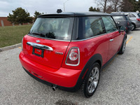 2011 MINI Cooper Red On Black Leather Interior • 1.6L • Front Wheel Drive • Auto • Push Start Engine... (image 7)