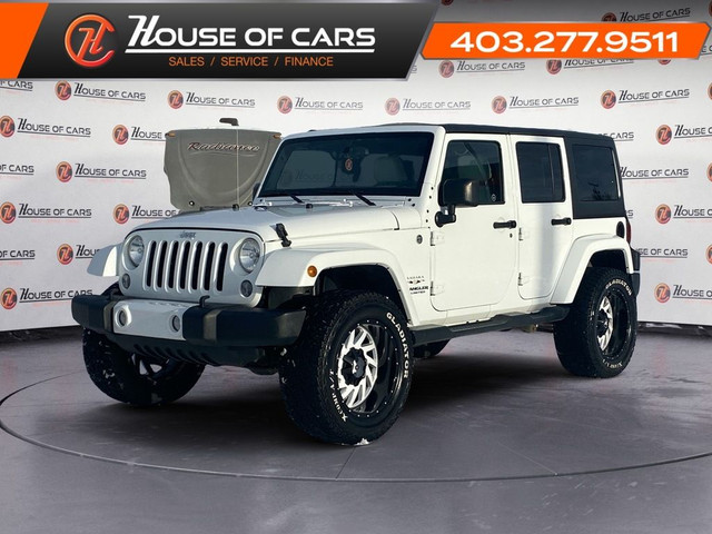  2016 Jeep WRANGLER UNLIMITED 4WD 4dr Sahara in Cars & Trucks in Calgary
