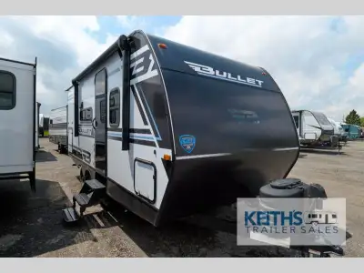 Keystone Bullet Classic travel trailer 1840RB highlights: Microwave Oven Pass-Thru Storage Full Rear...