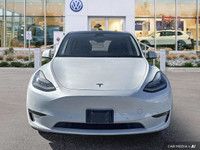 This Tesla Model Y delivers a Electric engine powering this Automatic transmission. Window Grid Ante... (image 7)