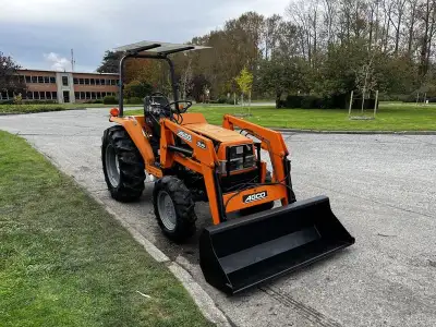 2001 Agco ST40 Tractor With SL46 Loader Diesel, red exterior, black interior, vinyl. Rear PTO indepe...