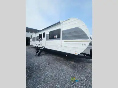 Forest River Wildwood travel trailer 33TS highlights: Private Bunkhouse Versa Queen Bed Custom King...