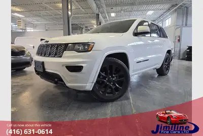 JUST TRADED IN AT A DEALER STORE. THIS IS A NICE JEEP LAREDO ALTITUDE IV IN MINT CONDITION IN &OUT....